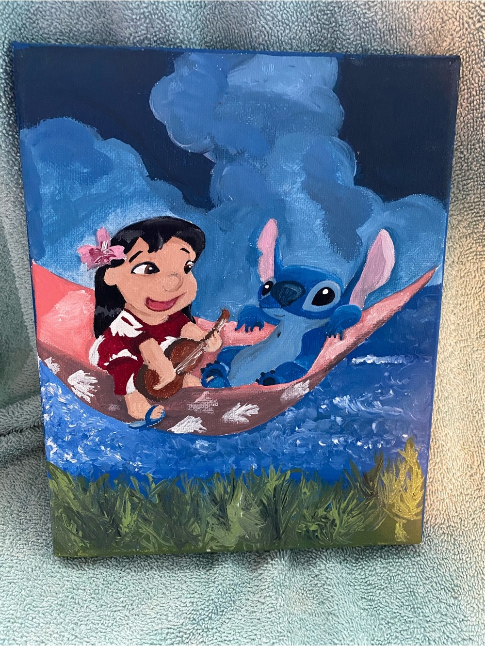 Original hand painted canvas art of Disney Lilo and Stitch. 8 in by 10 in
